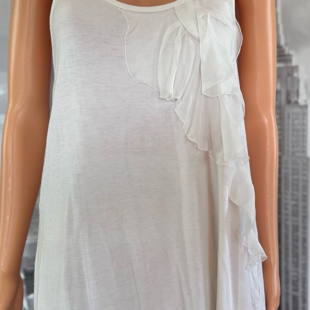 Elegant White Sleeveless Top with Ruffle Detail